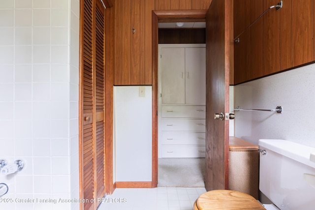 3129 Birch Row Dr, East Lansing, MI 48823 - bathroom featuring toilet, a closet, and tile patterned flooring