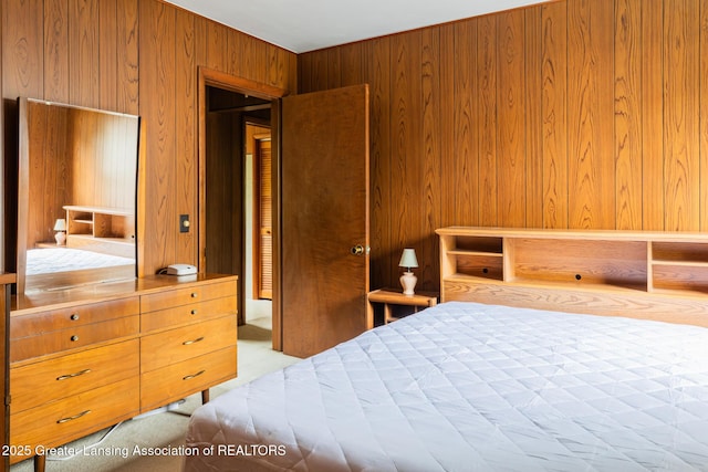 3129 Birch Row Dr, East Lansing, MI 48823 - carpeted bedroom featuring wooden walls