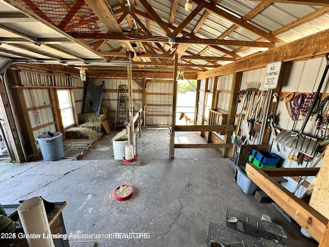 13862 Hartel Rd, Grand Ledge, MI 48837 - miscellaneous room featuring a garage and lofted ceiling