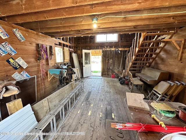 13862 Hartel Rd, Grand Ledge, MI 48837 - miscellaneous room with wood walls and hardwood / wood-style floors