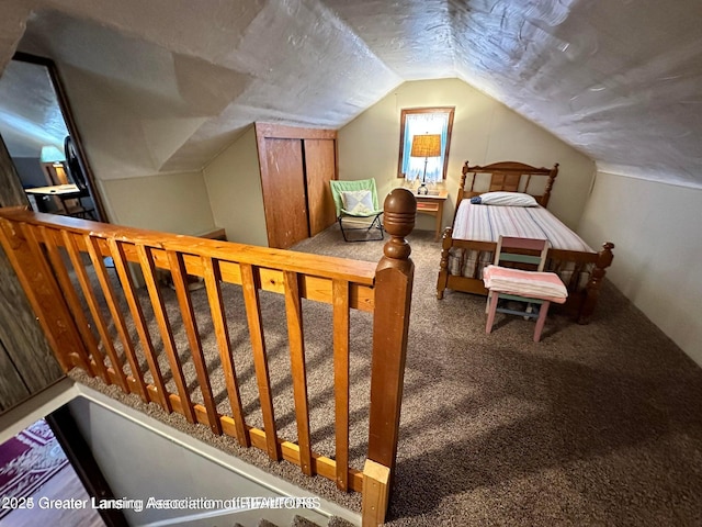 13862 Hartel Rd, Grand Ledge, MI 48837 - carpeted bedroom featuring vaulted ceiling