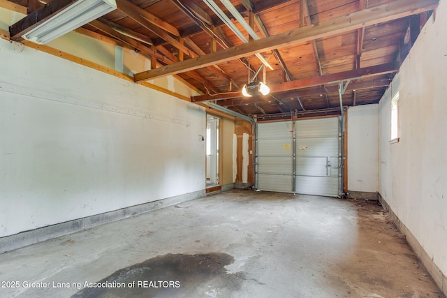 6394 Stephen, Brighton, MI 48116 - garage featuring a garage door opener