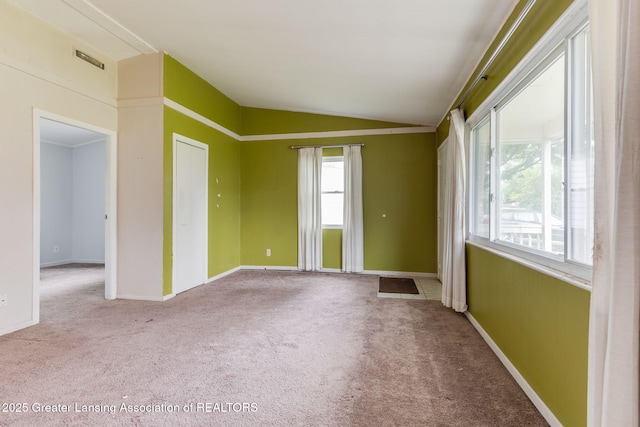 6394 Stephen, Brighton, MI 48116 - carpeted empty room with vaulted ceiling and baseboards