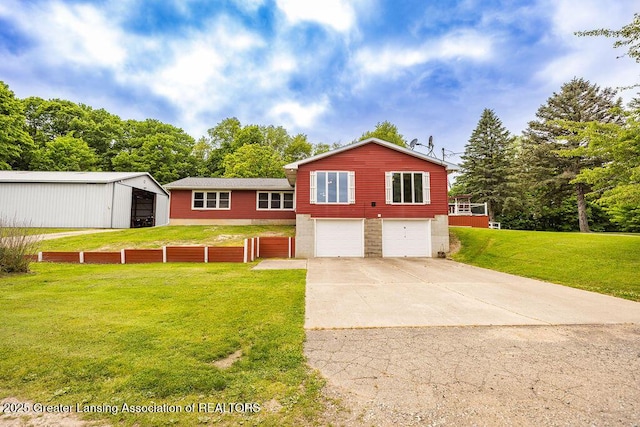 2278 Narrow Lake Rd, Charlotte, MI 48813 - tri-level home with a garage, a pole building, and concrete driveway