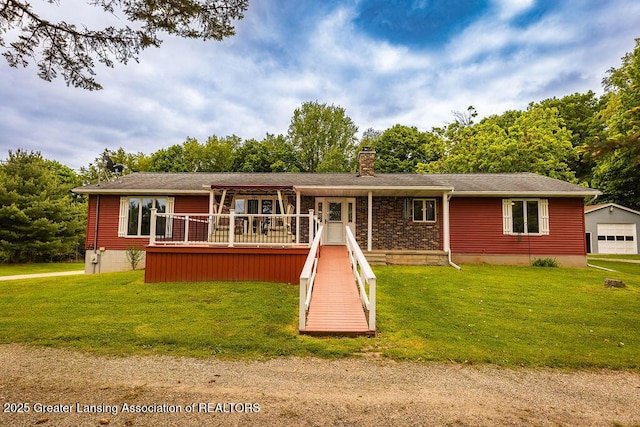 2278 Narrow Lake Rd, Charlotte, MI 48813 - ranch-style house featuring a front lawn, a chimney, and a detached garage