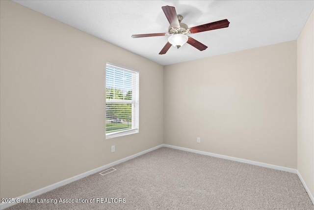 4026 Watts Ln, Lansing, MI 48911 - carpeted spare room featuring baseboards and ceiling fan