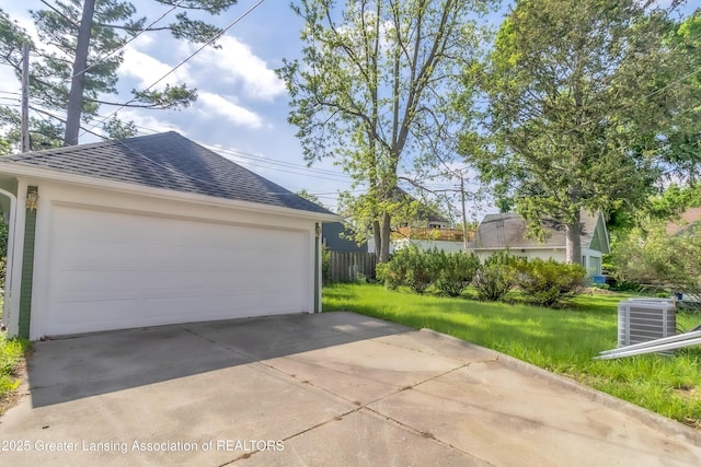 414 W St, Lansing, MI 48915 - detached garage featuring central air condition unit