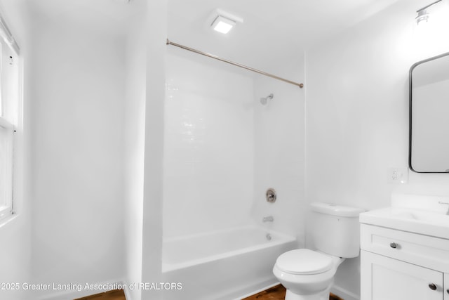 414 W St, Lansing, MI 48915 - full bathroom with vanity, bathing tub / shower combination, and toilet