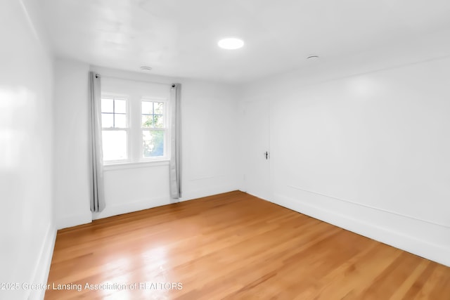 414 W St, Lansing, MI 48915 - spare room featuring light wood finished floors