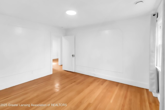 414 W St, Lansing, MI 48915 - unfurnished room with wood finished floors