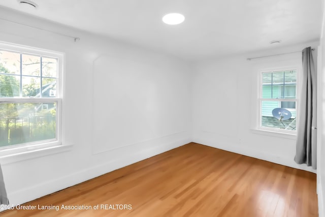 414 W St, Lansing, MI 48915 - spare room with light wood finished floors