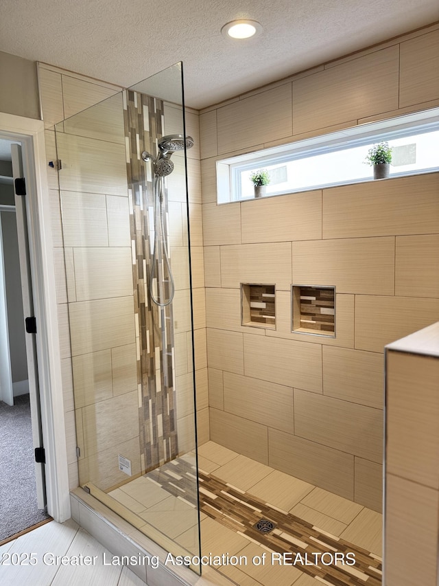 9135 Klein Farm, Grand Ledge, MI 48837 - bathroom with a stall shower, a textured ceiling, and recessed lighting