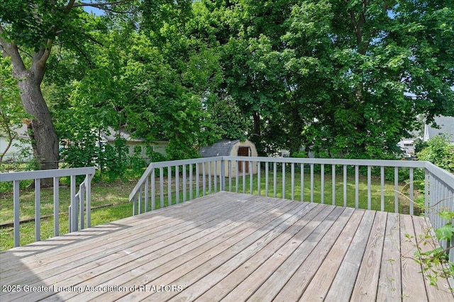 1200 W Rundle Ave, Lansing, MI 48910 - wooden terrace featuring a lawn