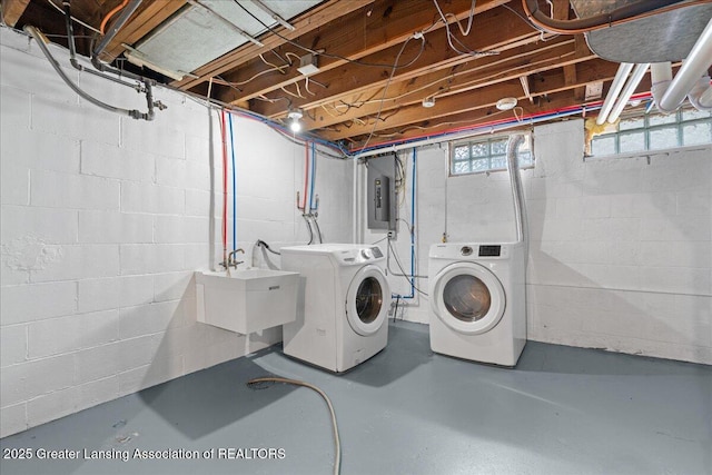 1200 W Rundle Ave, Lansing, MI 48910 - laundry room featuring washer and dryer and electric panel
