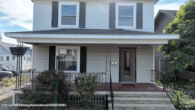 411 W Ionia St, Lansing, MI 48933 - view of front of house with a porch