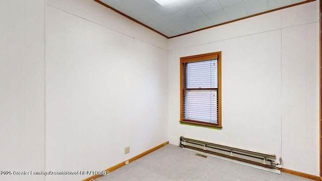 411 W Ionia St, Lansing, MI 48933 - unfurnished room featuring crown molding, baseboard heating, carpet floors, and baseboards