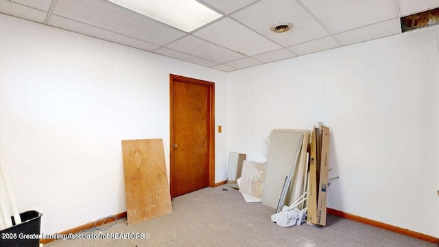 411 W Ionia St, Lansing, MI 48933 - carpeted spare room featuring a paneled ceiling