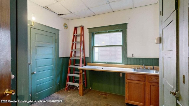 411 W Ionia St, Lansing, MI 48933 - office area featuring a sink, a paneled ceiling, and carpet floors