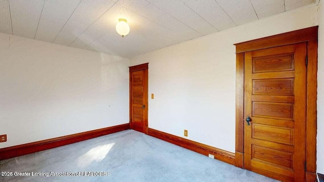 411 W Ionia St, Lansing, MI 48933 - carpeted spare room featuring baseboards