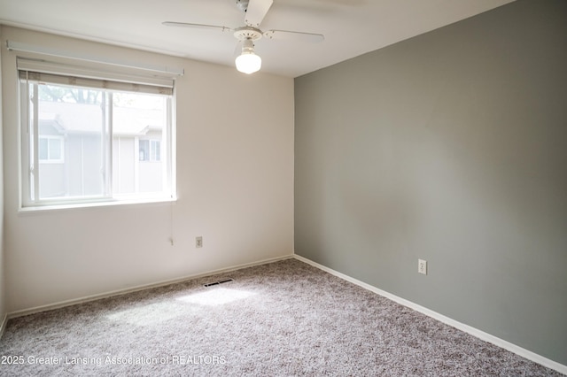 956 Trafalger Ln, East Lansing, MI 48823 - carpeted empty room featuring ceiling fan and baseboards