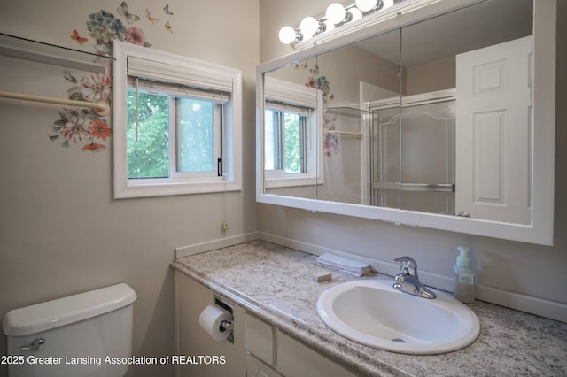956 Trafalger Ln, East Lansing, MI 48823 - bathroom with vanity and a shower with door