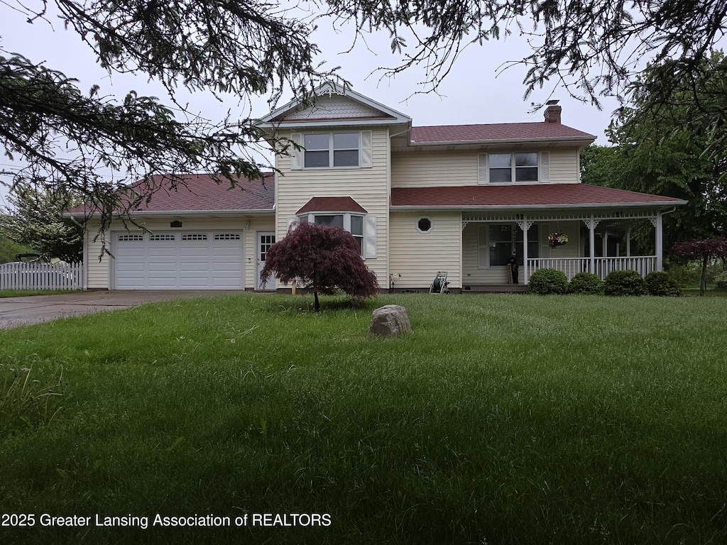 1443 Brookfield Rd, Charlotte, MI 48813 - view of front of house with a chimney, covered porch, an attached garage, and driveway