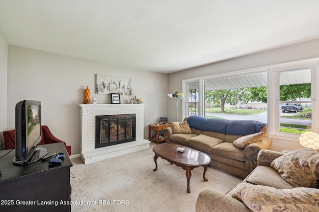 1416 Briarwood Dr, Lansing, MI 48917 - living area featuring carpet floors and a brick fireplace