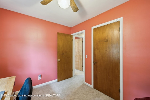 1416 Briarwood Dr, Lansing, MI 48917 - unfurnished bedroom with carpet, baseboards, and ceiling fan