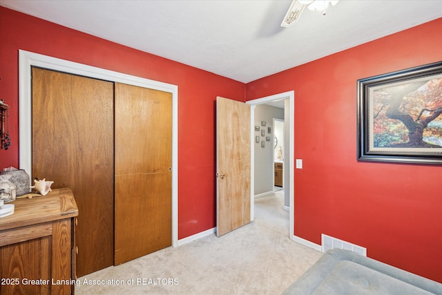 1416 Briarwood Dr, Lansing, MI 48917 - carpeted bedroom featuring a closet and baseboards