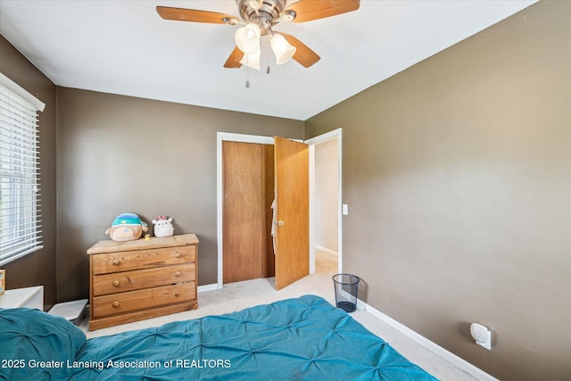 1416 Briarwood Dr, Lansing, MI 48917 - carpeted bedroom featuring baseboards and ceiling fan