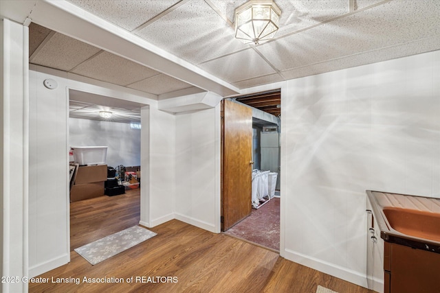 1416 Briarwood Dr, Lansing, MI 48917 - hall featuring wood finished floors and baseboards