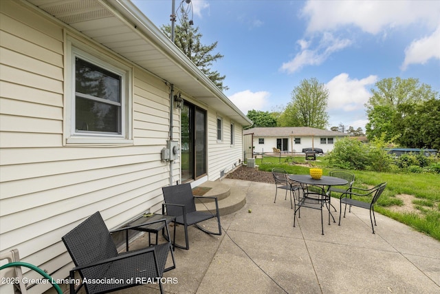 1416 Briarwood Dr, Lansing, MI 48917 - view of patio featuring outdoor dining space