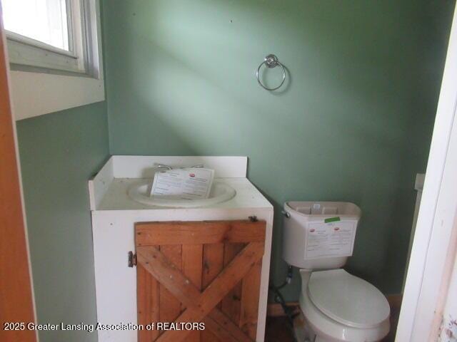 2071 Vandekarr Rd, Owosso, MI 48867 - bathroom with vanity and toilet