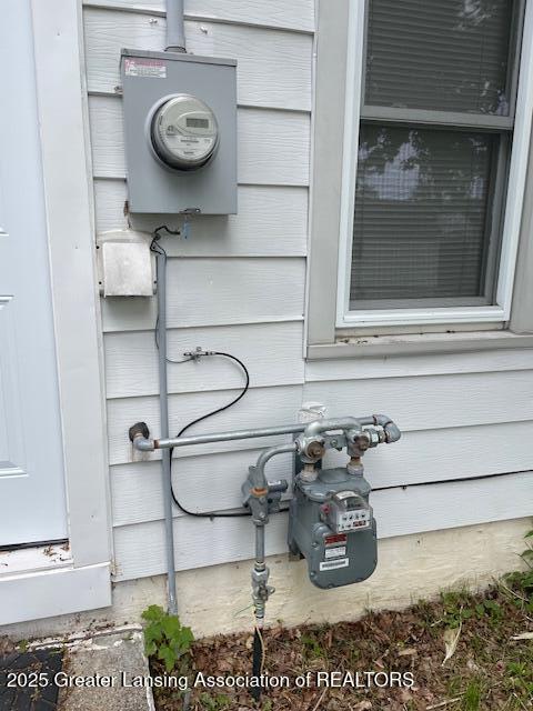 2303 Devonshire Ave, Lansing, MI 48910 - exterior view of electric meter and gas meter