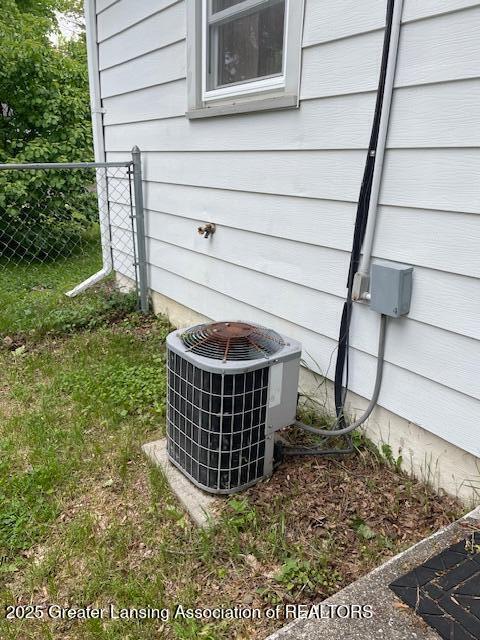 2303 Devonshire Ave, Lansing, MI 48910 - exterior view of central air condition unit