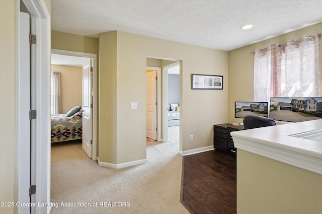 3893 E Plover Pl, East Lansing, MI 48823 - carpeted office featuring a textured ceiling, baseboards, and recessed lighting