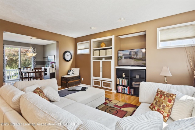 3893 E Plover Pl, East Lansing, MI 48823 - living area featuring wood finished floors