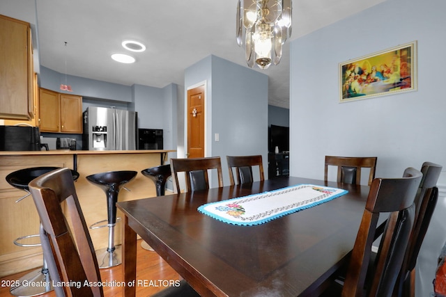 4716 Wainwright Ave, Lansing, MI 48911 - dining area featuring wood finished floors