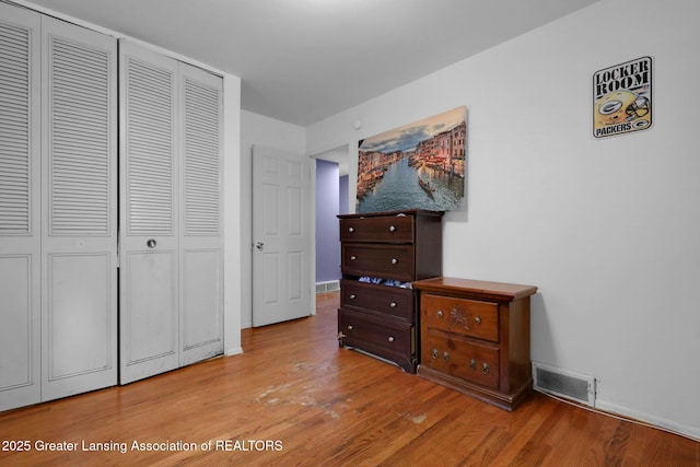 4716 Wainwright Ave, Lansing, MI 48911 - bedroom featuring a closet and wood finished floors