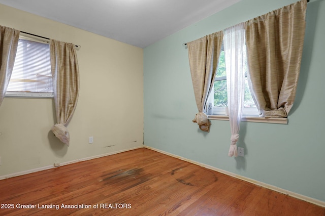 4716 Wainwright Ave, Lansing, MI 48911 - empty room with wood finished floors and baseboards