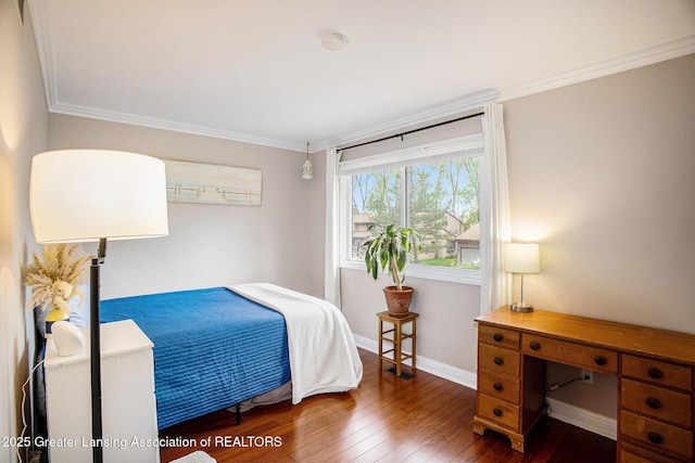 2022 Greenwich Ct, Lansing, MI 48910 - bedroom with hardwood / wood-style floors, baseboards, and ornamental molding