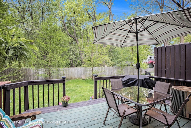 2022 Greenwich Ct, Lansing, MI 48910 - wooden terrace featuring outdoor dining area and cooling unit