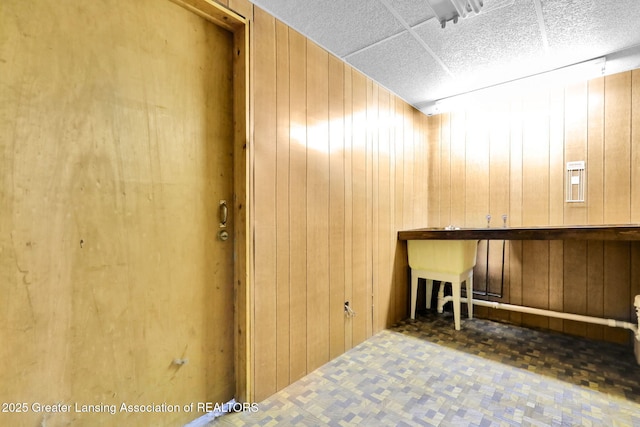 1450 N Hagadorn Rd, East Lansing, MI 48823 - misc room featuring wooden walls