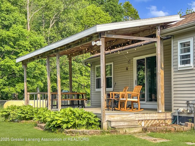 7413 E 5th Point Highway, Eaton Rapids, MI 48827 - view of wooden deck