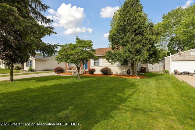6187 Towar Ave, East Lansing, MI 48823 - obstructed view of property with a garage
