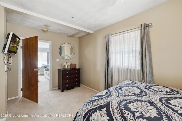 6187 Towar Ave, East Lansing, MI 48823 - bedroom with light colored carpet and baseboards