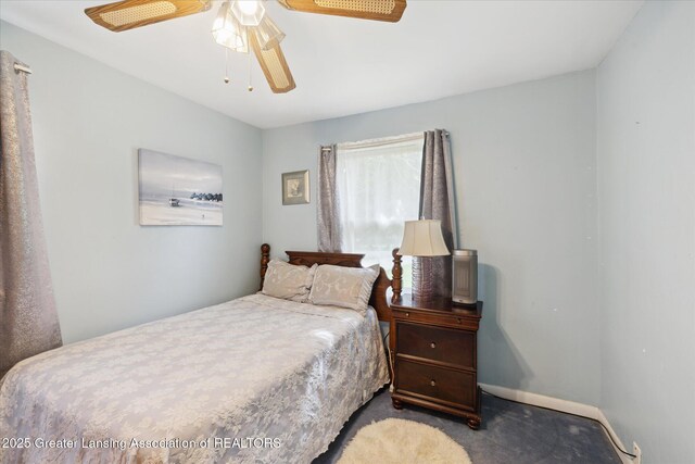 6187 Towar Ave, East Lansing, MI 48823 - bedroom with carpet floors, ceiling fan, and baseboards