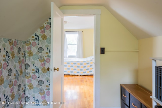 1311 Moores River Dr, Lansing, MI 48910 - bathroom with vaulted ceiling and wood finished floors
