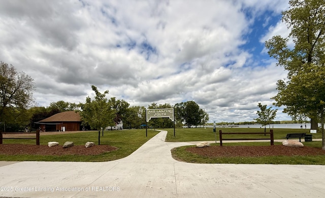 5880 Shaw St, Haslett, MI 48840 - surrounding community with a lawn