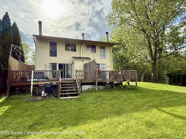 5880 Shaw St, Haslett, MI 48840 - back of house with a lawn and a deck